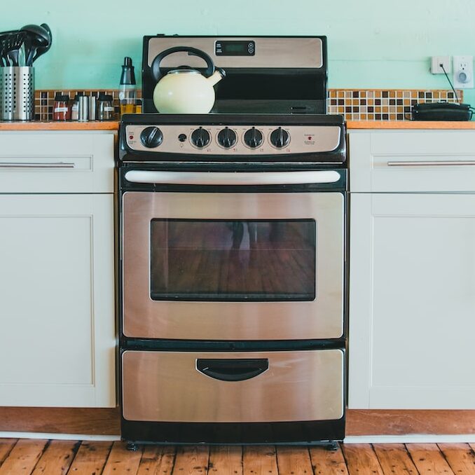 white and black gas range oven