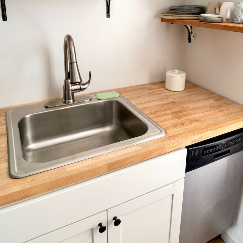 stainless steel faucet on sink